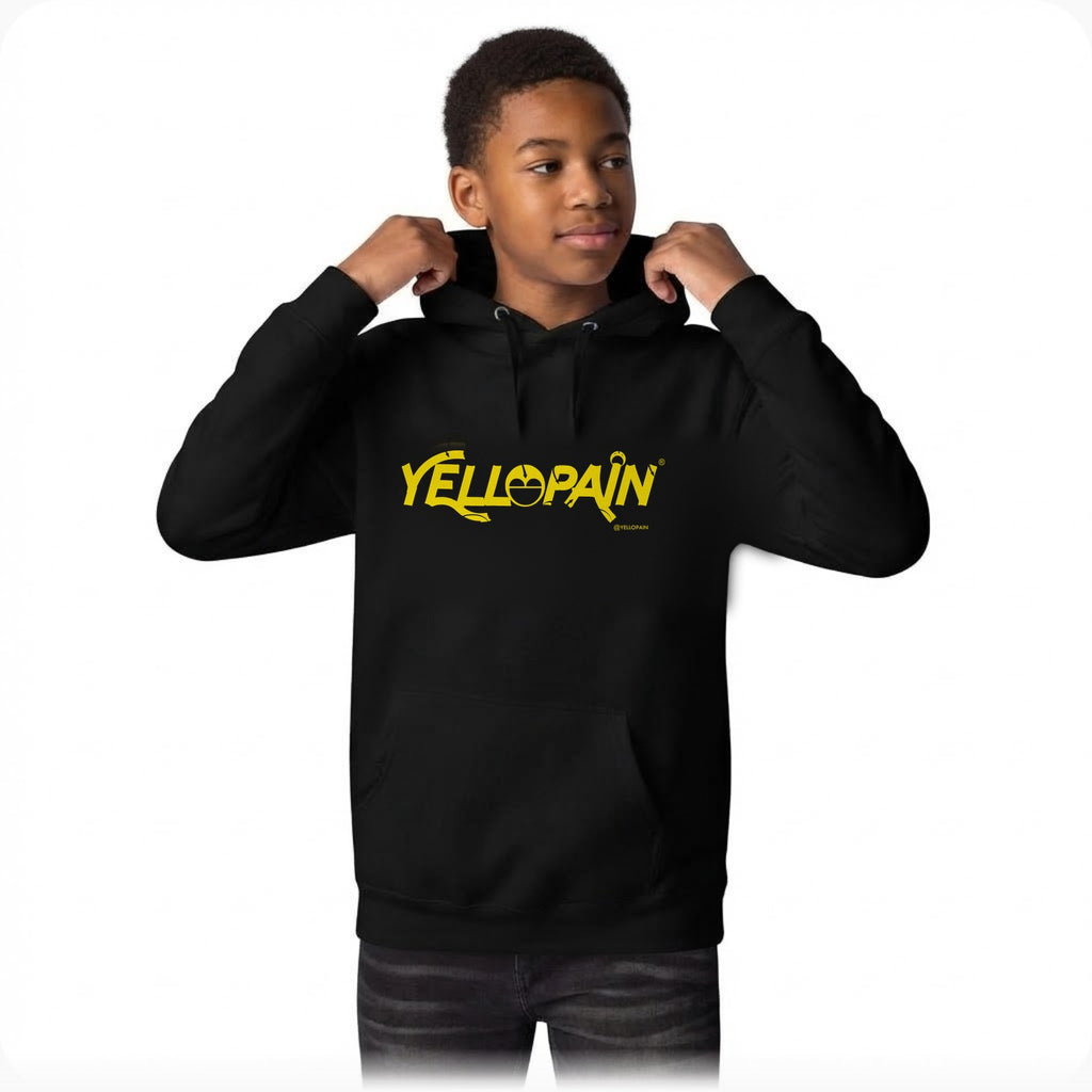Teen model wearing the black YelloPain logo hoodie